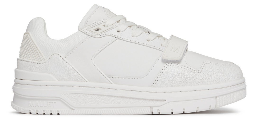 White sneaker with velcro straps on a white background