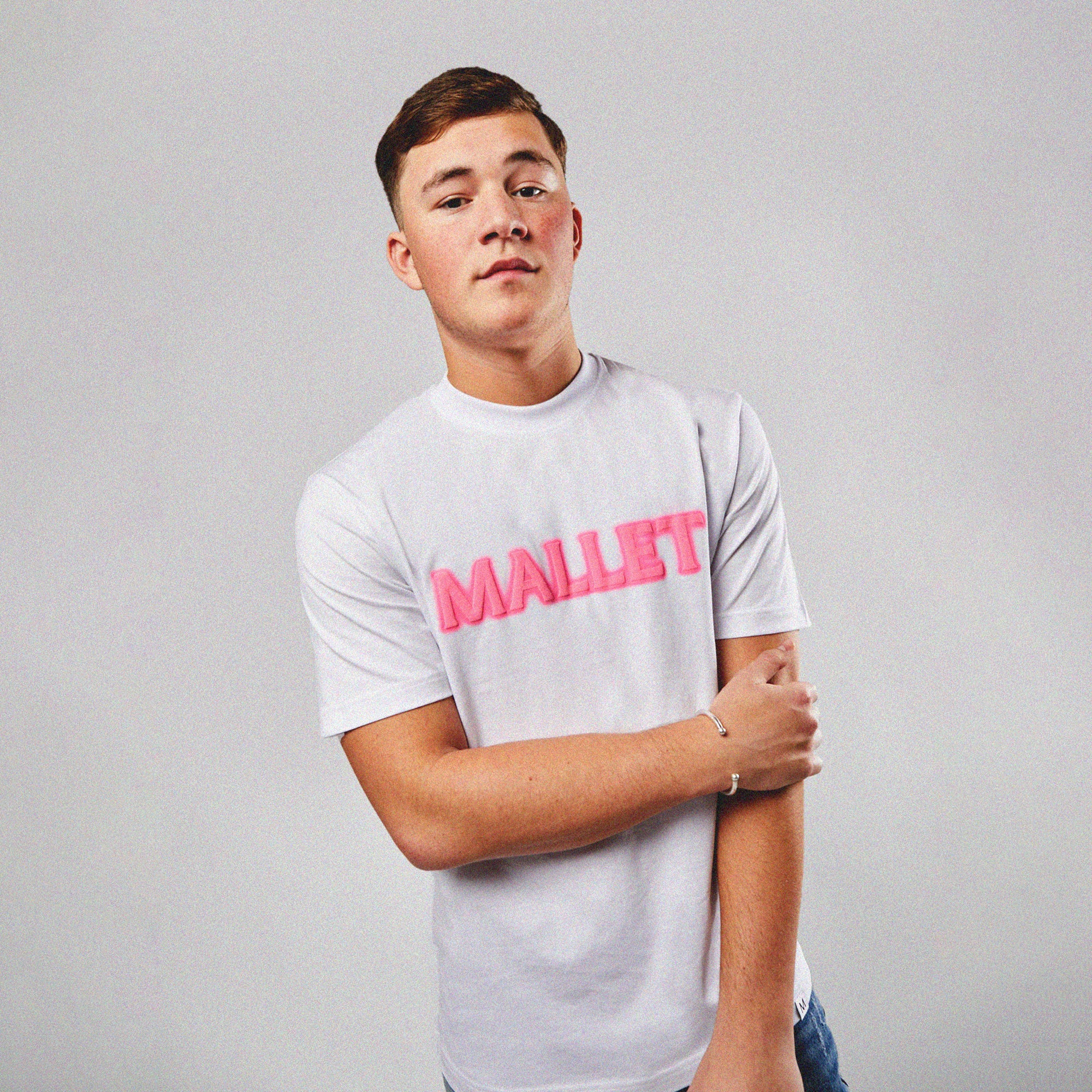 Pink t shirt logo best sale