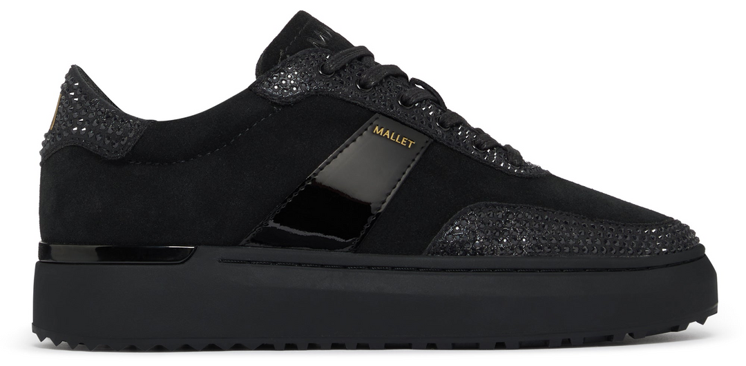 Black trainer with swarovski crystals on a white background