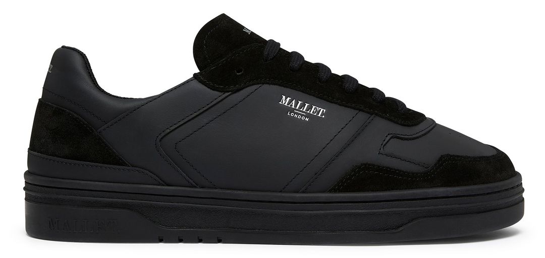 Black sneaker with 'Mallet' branding on a white background